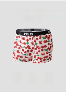 Close-up of breathable ice silk men's boxer briefs with red cherry print and black waistband