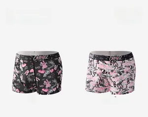 Detail of men's boxer briefs with graffiti prints and branded elastic waistbands