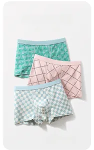 Detailed set of three teenage boys cotton boxer briefs with diverse geometric and text patterns
