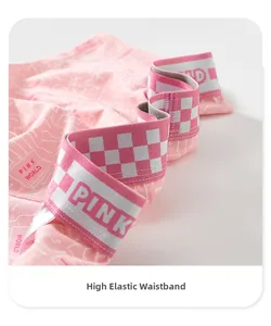Detail of high-elastic pink waistband with integrated logo and checkered pattern