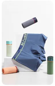 Detail showing colorful cotton boxer briefs with modern elastic waistbands and slogan prints