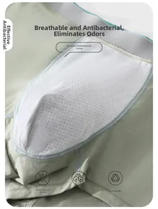 Detail of men's cotton boxers with wormwood antibacterial mesh lining and green fabric