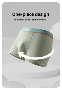 Detail of light green men's boxers showing seamless one-piece cut and soft cotton texture