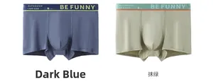 Detail view of breathable cotton boxer briefs in dark blue and green with printed waistbands