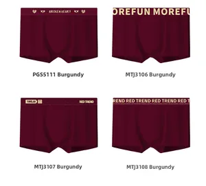 Detail view of burgundy men's cotton boxers with four different elastic waistband styles