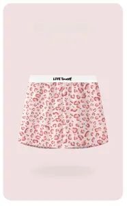 Detailed view of pink leopard print boxer shorts with Love Yourself lettered waistband