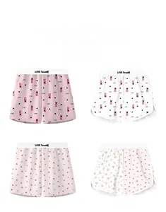 Detail view of four patterned high waist lounge shorts featuring LOVE Yourself waistbands