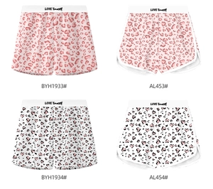 Detail view of pink leopard and heart print boxers with LOVE Yourself elastic waistband