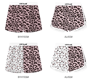 Detail view of pink leopard print ice silk lounge shorts with Love Yourself waistband