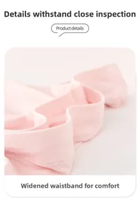 Detail of pink modal underwear featuring a wide elastic waistband and soft knit texture