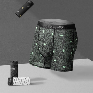 Men's ice silk boxer briefs with green abstract print and black elastic waistband