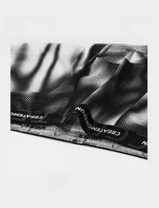 Detailed close-up of breathable men's underwear waistband with CREATEMOREFUN logo