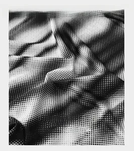 Macro view showing the breathable halftone texture of the comfortable ice silk fabric