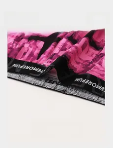 Detail of pink camo ice silk underwear with black elastic waistband and letter embroidery
