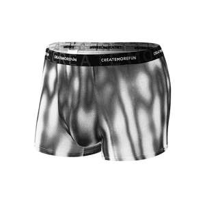 Men's ice silk boxer briefs with black and gray halftone pattern and elastic waistband