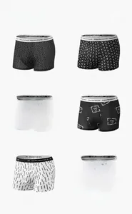 Six assorted men's boxer briefs featuring trendy prints and 'Enjoy the World' waistbands