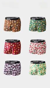 Collage of six printed men's boxer briefs with diverse food and fruit patterns