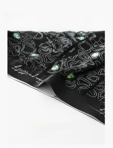 Close-up of lightweight elastic waistband with green topographic print for men's underwear