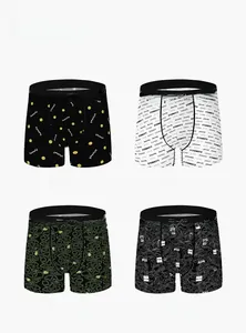 Detail view of four printed men's ice silk boxer briefs with elastic logo waistbands