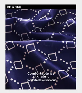 Close-up of dark blue ice silk fabric with white geometric chain pattern on boxers