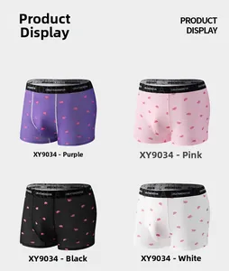 Detail of breathable ice silk boxer briefs with pink elephant pattern and elastic waistband