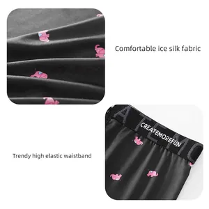 Men's breathable ice silk boxer briefs with pink elephant print and elastic waistband