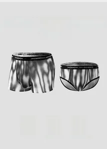 Detailed view of breathable mesh texture and printed waistband on men's boxer briefs