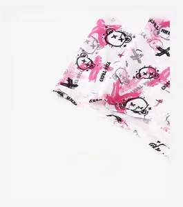 Macro shot of reinforced trouser cuffs with pink bear graffiti and PINK TREND print