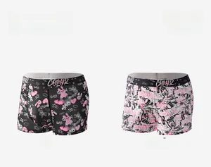 Close-up of men's breathable boxer briefs with graffiti heart and rabbit patterns