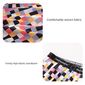 Men's ice silk plaid boxers with elastic waistband featuring CREATEMOREFUN text