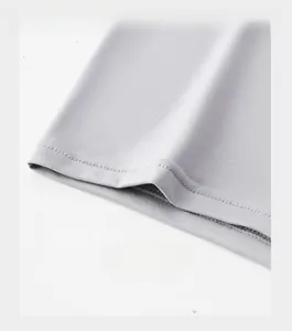 Close-up of reinforced trouser cuffs with durable stitching on gray men underwear