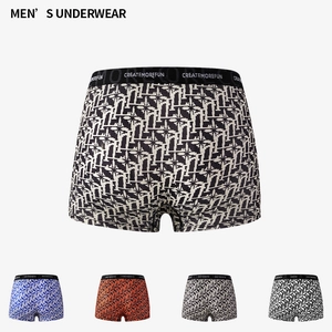 Men's geometric print boxer briefs with wide elastic waistband in multiple colors