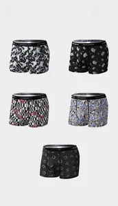 Detailed view of elastic waistband with lettering on various printed men boxer briefs