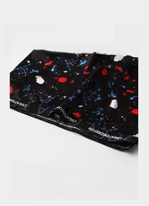 Detail of high-elastic waist band with text on lightweight printed men's boxer briefs