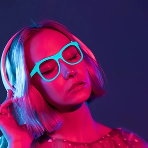 Cyberpunk LED glowing glasses and white headset with neon pink and cyan light effects