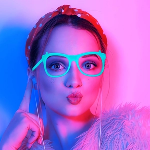 Close-up of neon green fashion eyewear frame on model in cyberpunk lighting decor