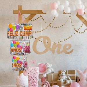 Three-tier colorful fringe backdrop banner with Feliz Cumpleaños Spanish birthday text