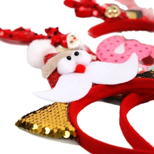 Cerchietto natalizio con corna di renna e pupazzo di Babbo Natale per feste a tema