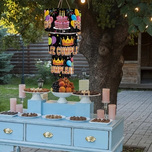Three-tier birthday party hanging decoration with Feliz Cumpleaños text and festive motifs