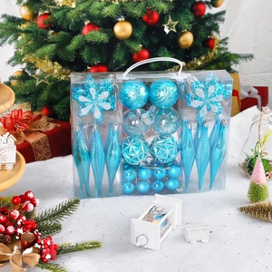 Blue Christmas ornament set in transparent gift box featuring snowflake and ball shapes