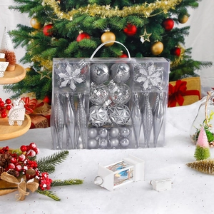 Silver Christmas ornament set with glitter balls and icicles in a clear gift box