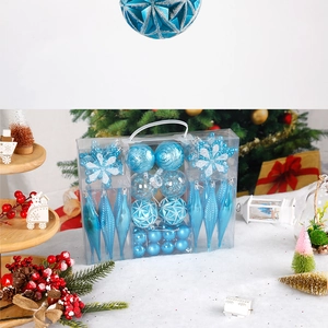 Blue Christmas ornament set with snowflakes and icicles in a transparent gift box