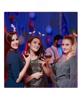 Models wearing red glitter heart and devil horn headbands at a festive Valentine's Day party