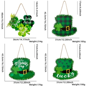Detailed view of Saint Patrick's Day wooden door hangers with green clover and hat designs