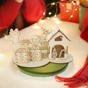 Laser cut wooden Christmas puzzle ornaments with reindeer and Santa on a warm table