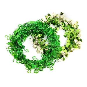 Green St. Patrick's Day shamrock tinsel garlands for festive yard and patio decoration