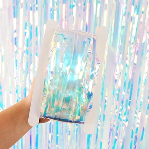 Thick iridescent foil fringe curtain in aurora laser colors for party wall decoration