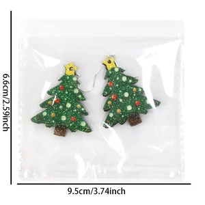 Festive Christmas tree hook earrings with colorful sequins and star detail for holiday party