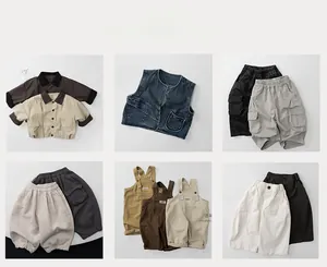 Flat lay of Japanese style children's cotton outfits in earth tones with matching accessories