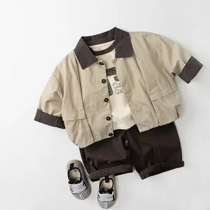 Kids casual three-piece cotton set with beige jacket, white tee, and brown shorts